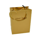 Ecoの友好的な注文のペーパー綿ロープのハンドルが付いている210gsm技術の金ホイルを買い物袋